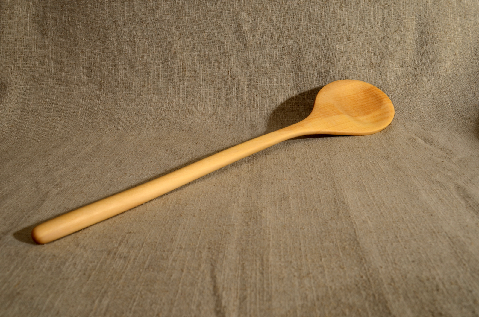Wooden spoon hand carved of plum